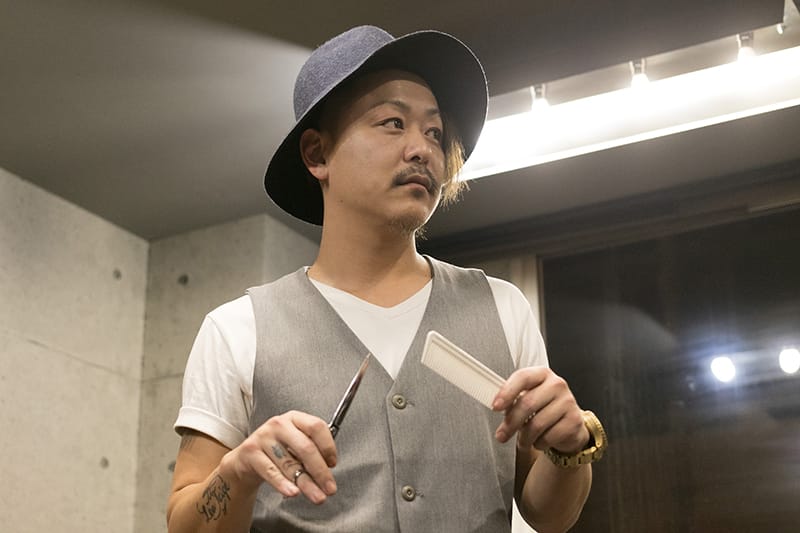 間村 哲也